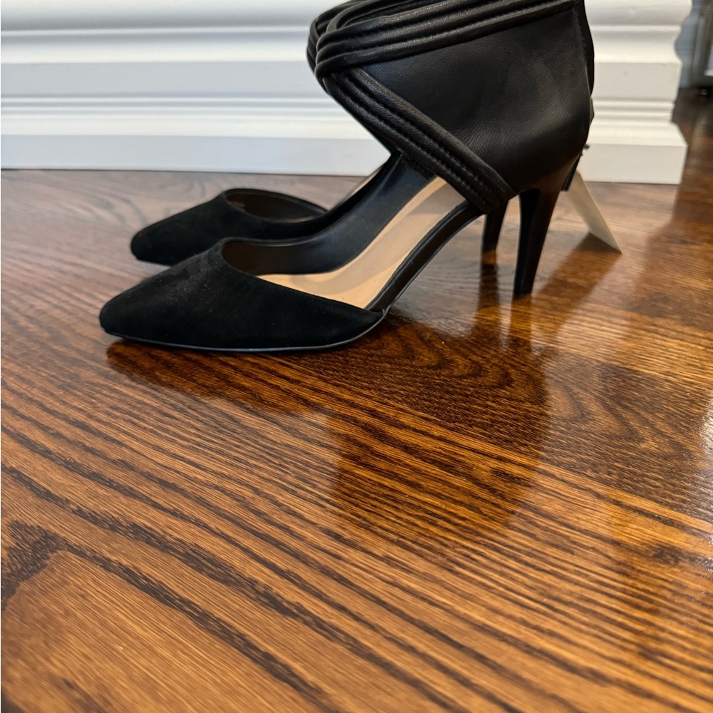 Black heels. Size 6.5. New.
